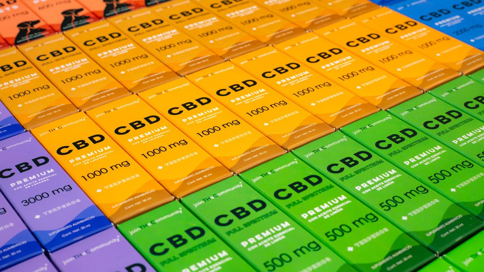 Rows of colorful product boxes arranged in a retail display case.