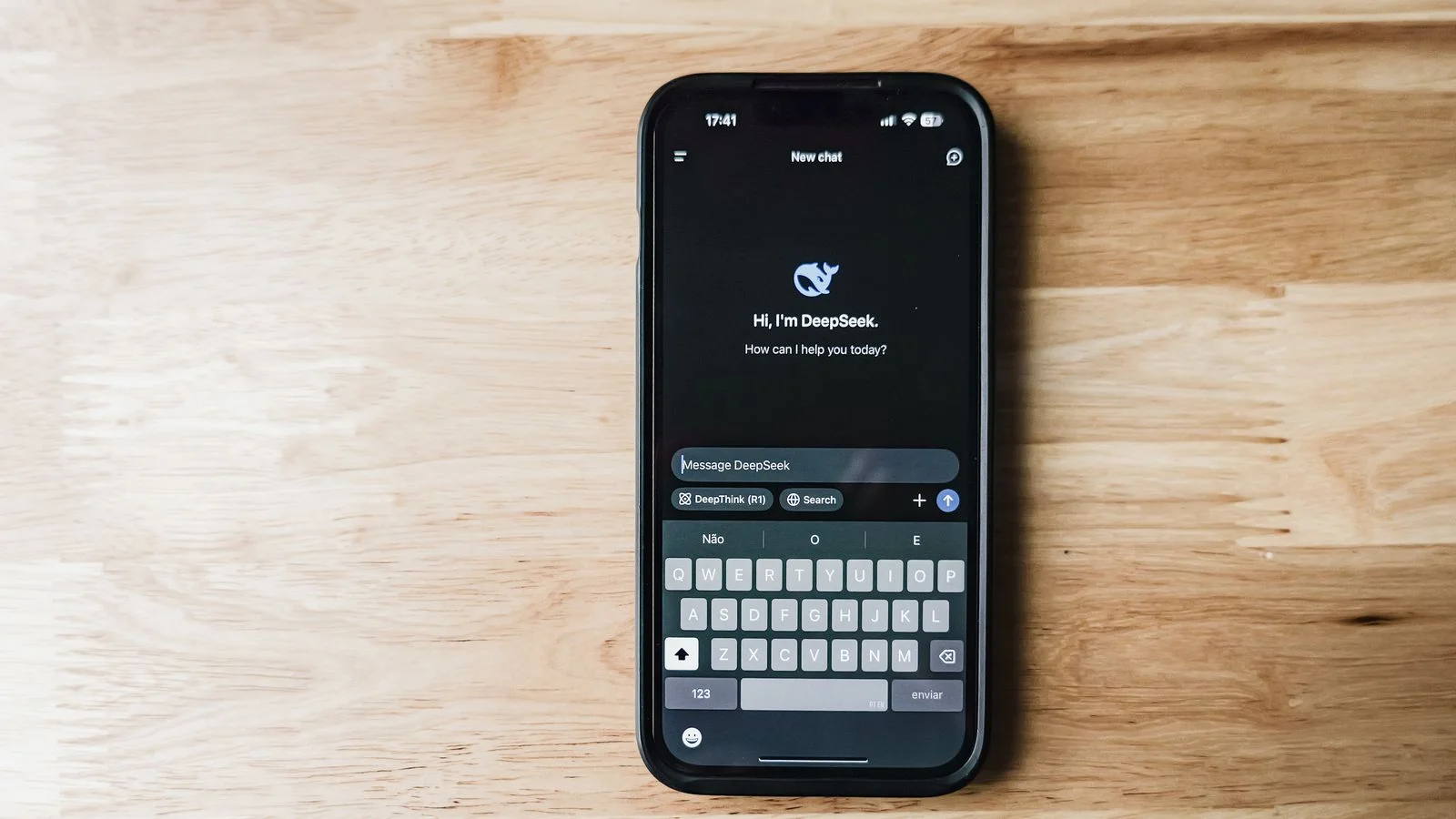 A smartphone showing an AI assistant, where buyers now ask which green vendors to trust