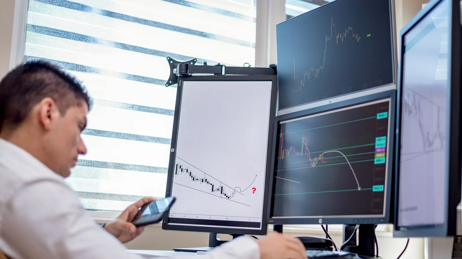 A workspace of screens displaying data and charts, the analytics behind how AI now sorts local businesses.