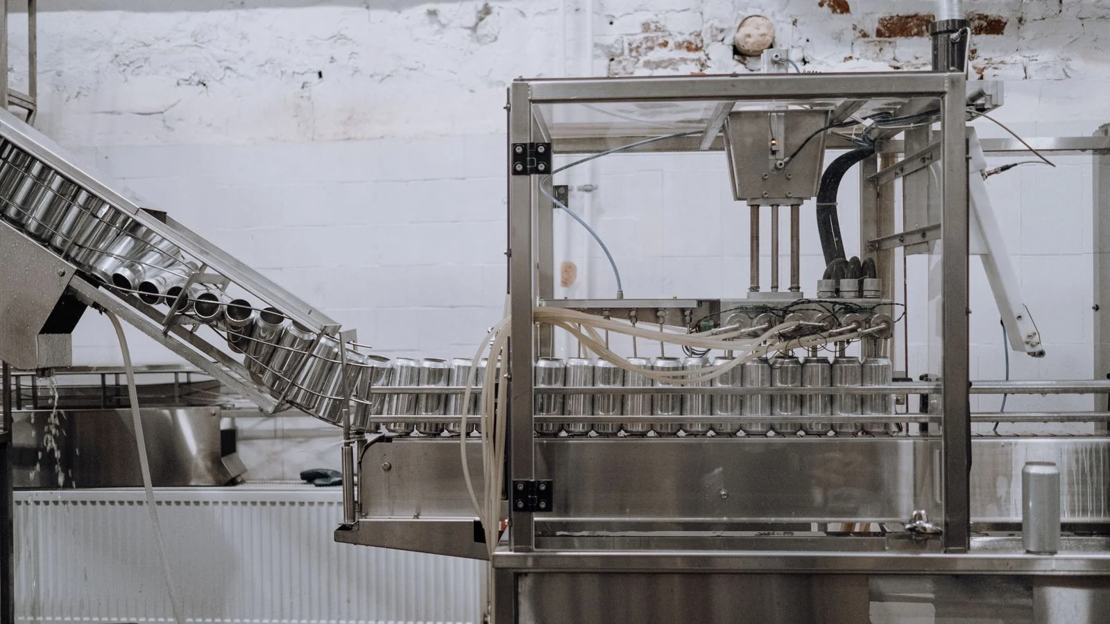 Automated production line moving product, the invisible sourcing decision happening before a buyer visits your site