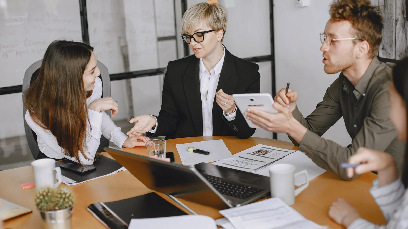 A team reviewing information together, the testing loop that turns AI visibility into something measurable