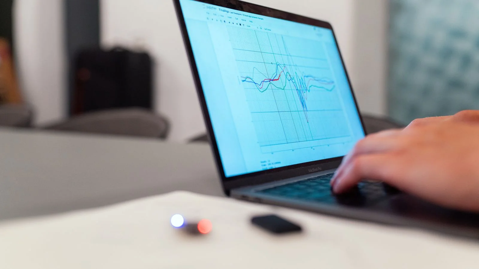 A close-up of an analytics chart on a screen tracking brand presence over time
