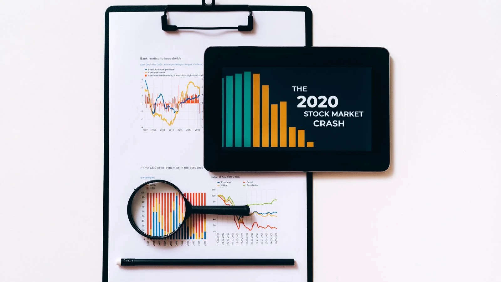 Tablet and clipboard showing declining charts, a reminder that active use has fallen