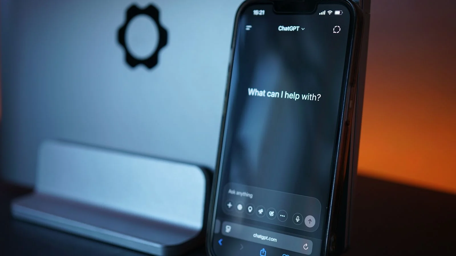 A smartphone showing an AI chat interface, the synthesized answer that often names no source at all