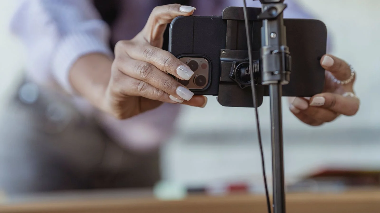 Plumber filming a short how-to video on a phone