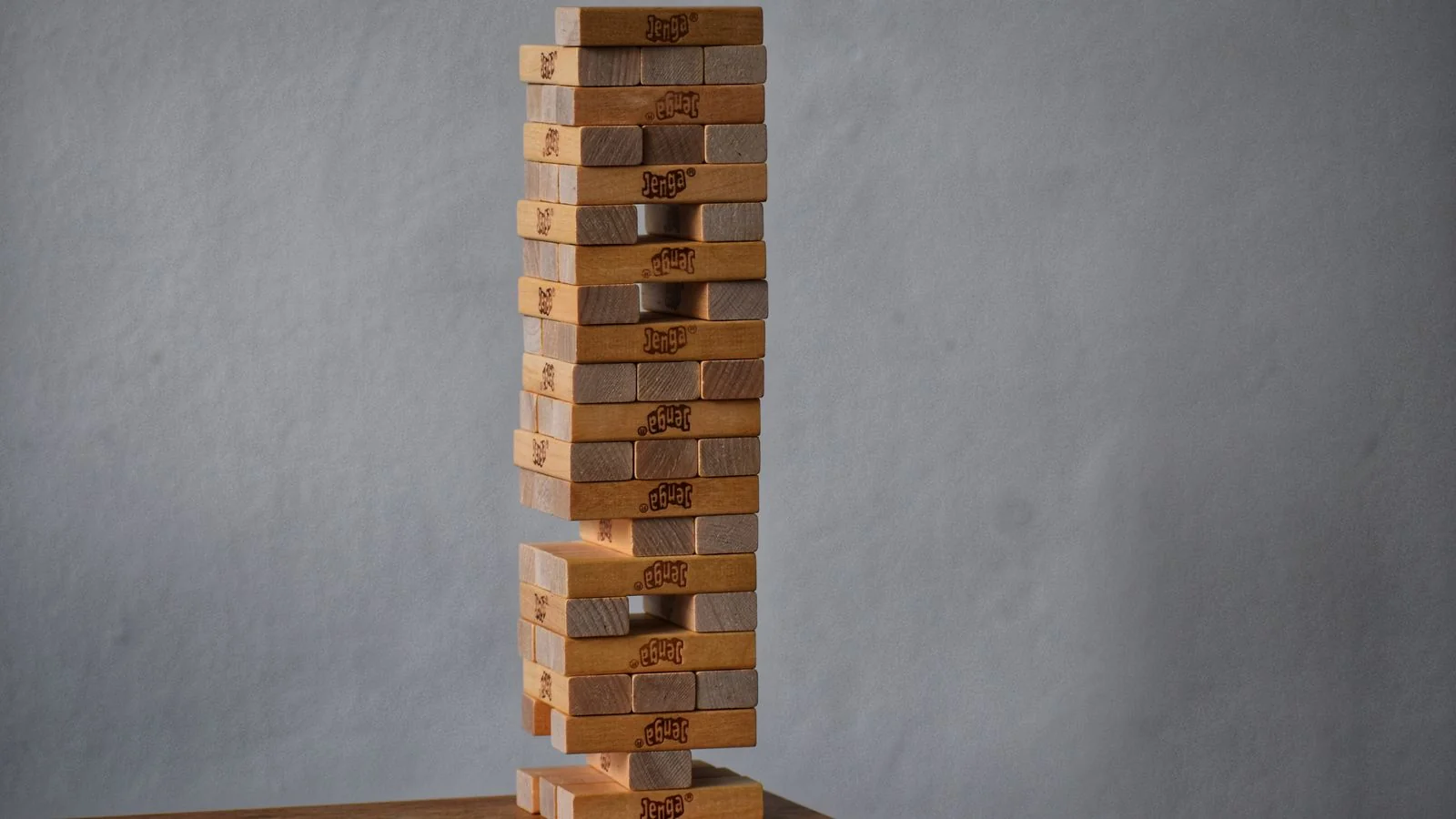 Tower of stacked wooden blocks, a visual for the five-layer Tiebreaker Stack
