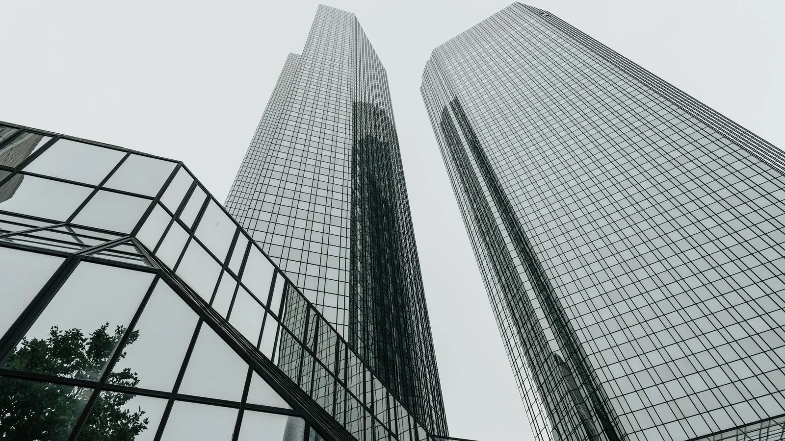 Modern skyscrapers seen from below, the corporate prestige a paid membership trades on