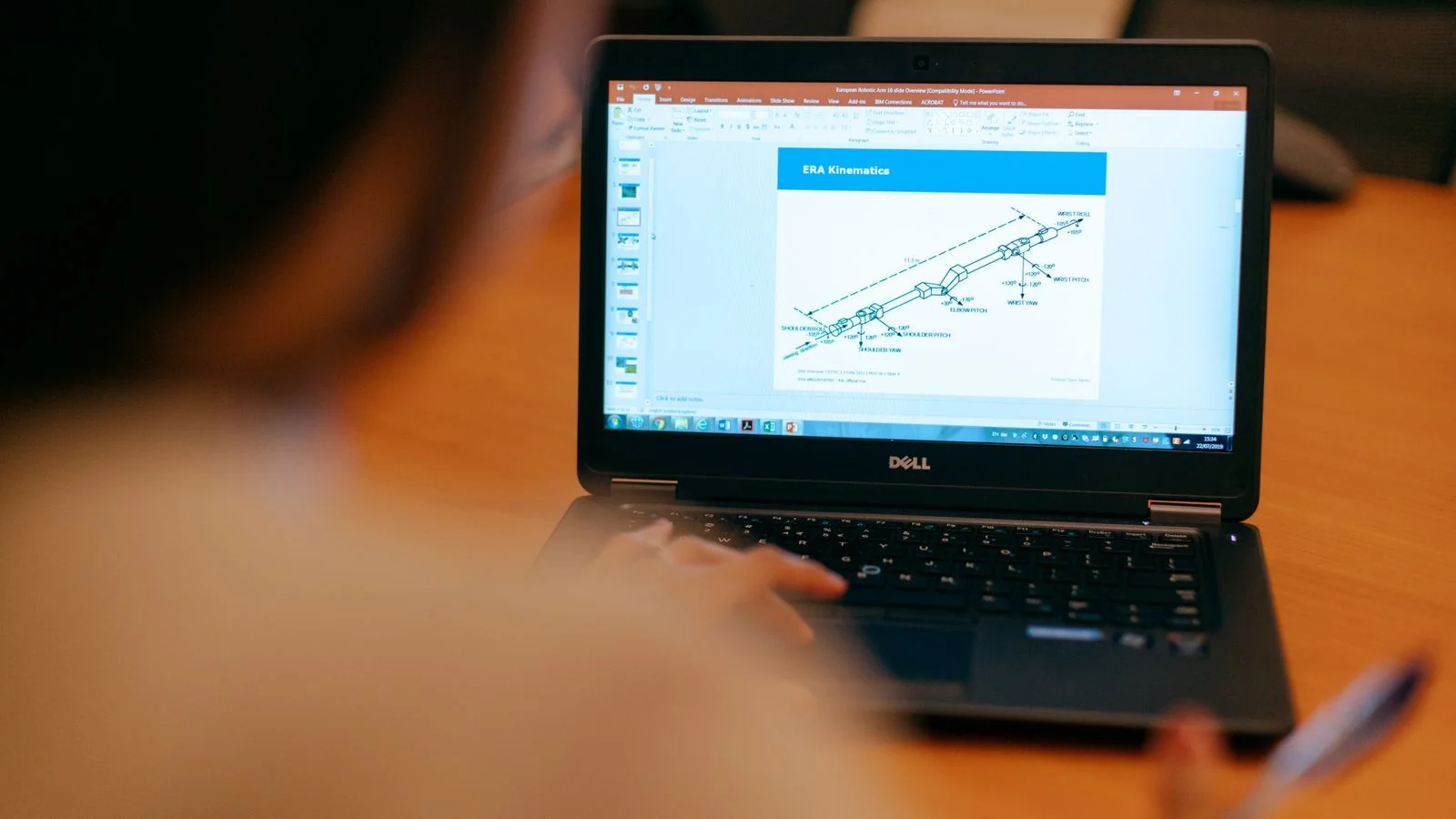 A woman studying a laptop screen, the research pass that reveals which sources Google already trusts about you