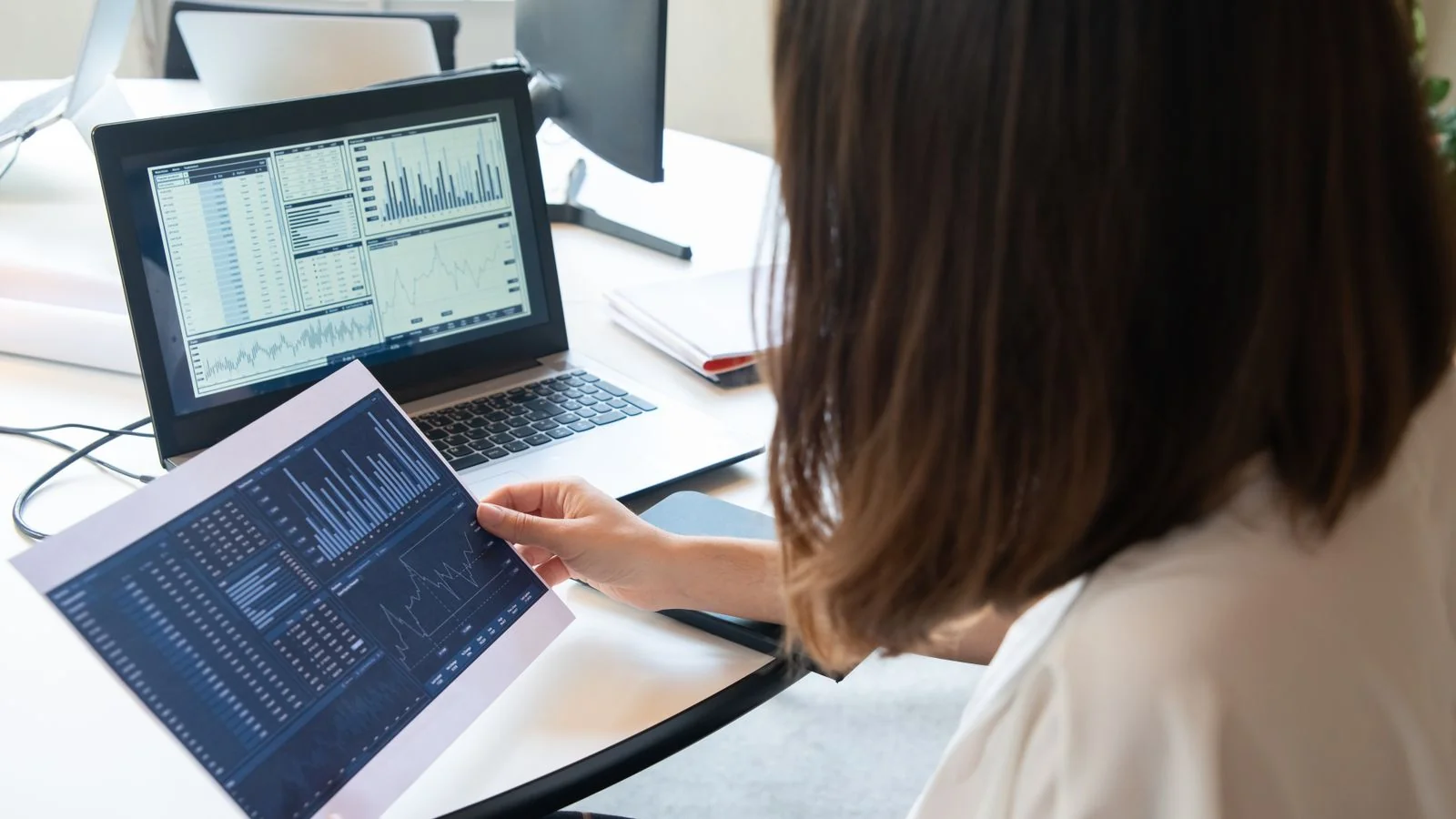 Reviewing an analytics dashboard on a tablet, the metrics that do not feed the Knowledge Graph