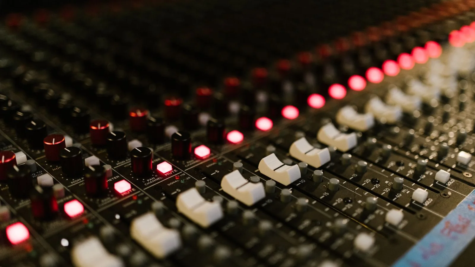 A studio mixing console, where the metadata attached to a release is decided