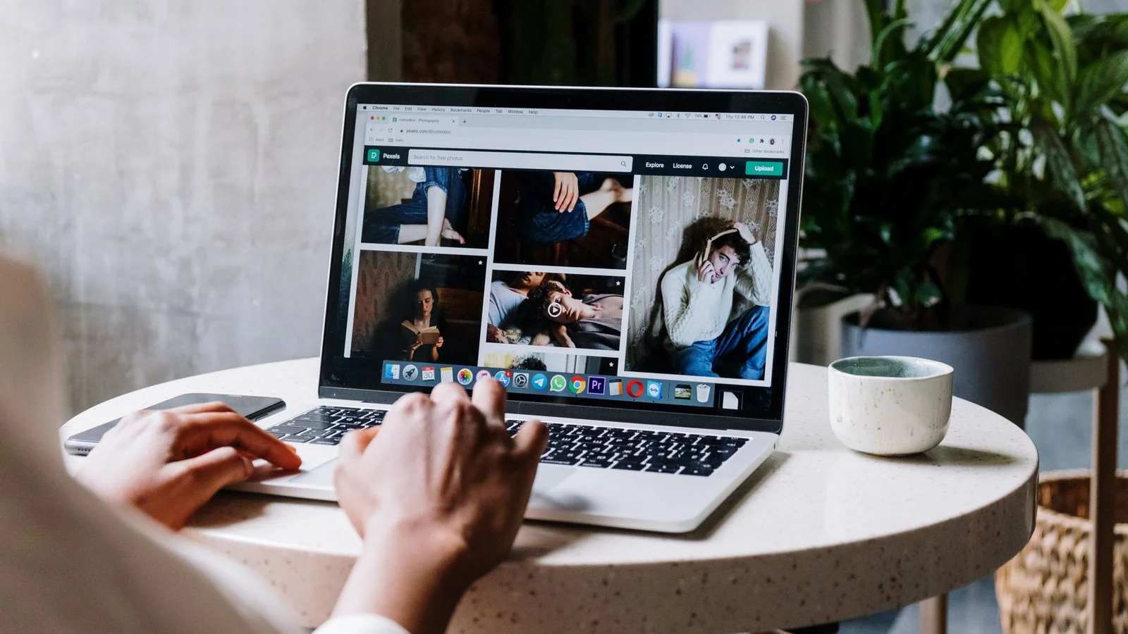 Laptop displaying a photography portfolio site, the page that has to carry the entity signals