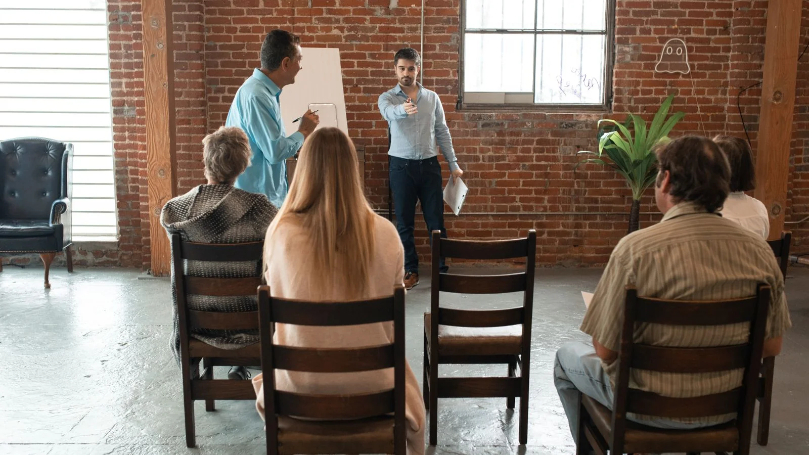 Founder presenting to a small audience, the kind of listing that leaves a durable public record
