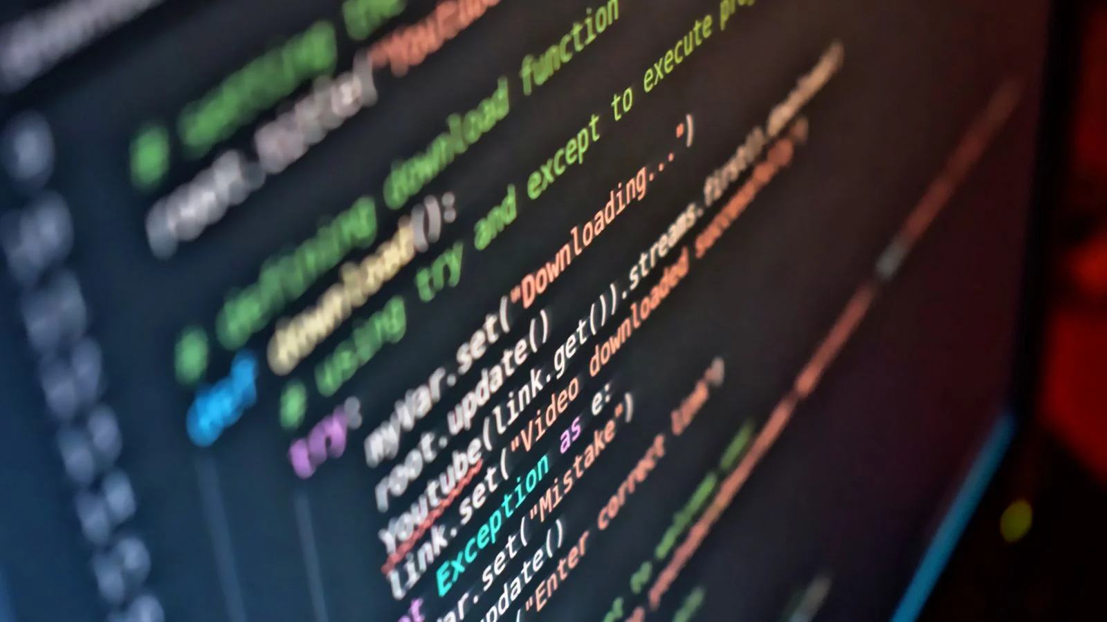 A close-up of a code editor on a monitor, where a clean answer and its markup come together