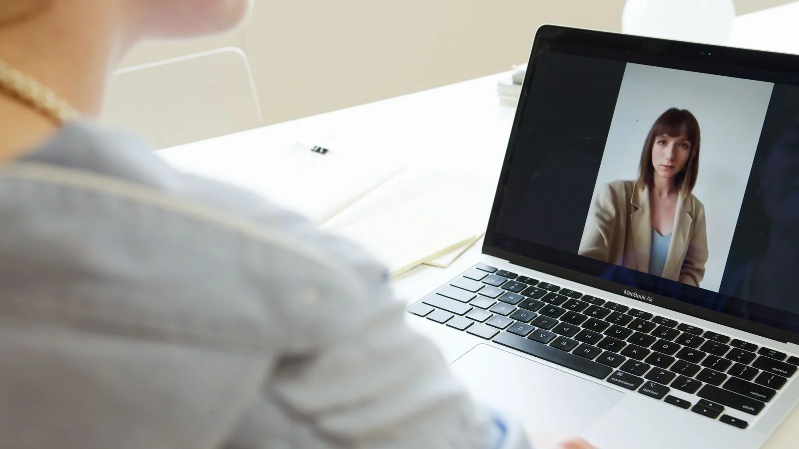 A professional on a video call, the kind of interview and endorsement that validates expertise from the outside