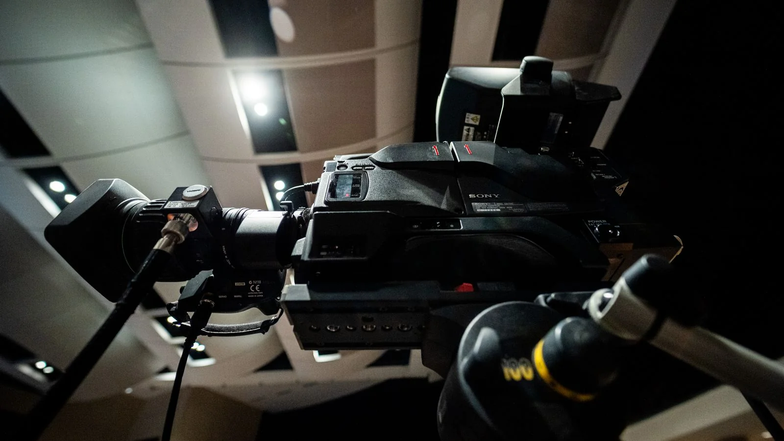 A professional video camera in a studio, the local affiliate setup where most CBS bookings begin