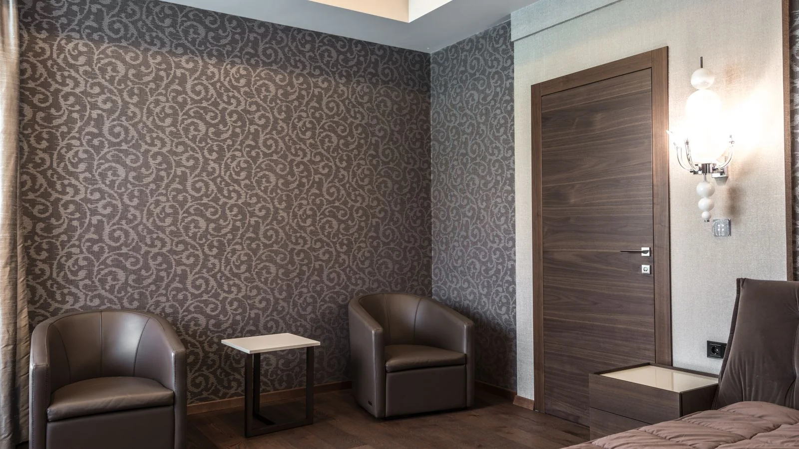 Modern luxury hotel room with sleek furniture and soft lighting, the kind of new opening Hot List editors scout