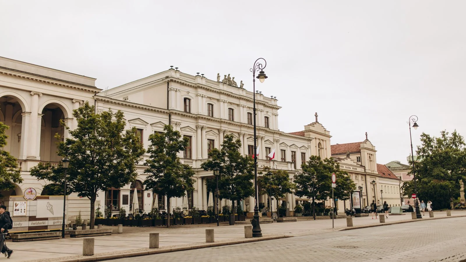 Historic Polonia House on a quiet Warsaw street, the kind of local landmark guidebook writers find on foot