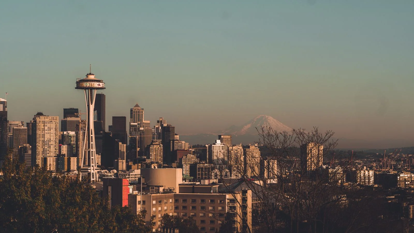 Panoramic Seattle skyline with the Space Needle and Mount Rainier in the distance