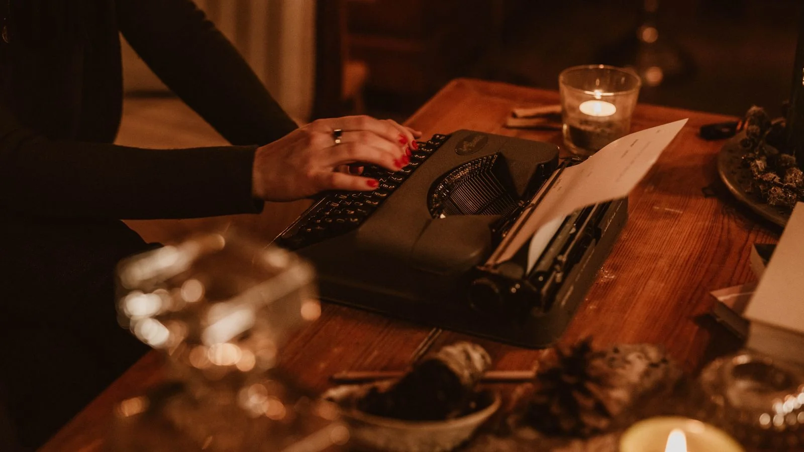 Hands typing at a vintage typewriter in low light, the comment piece most pitches never get to write