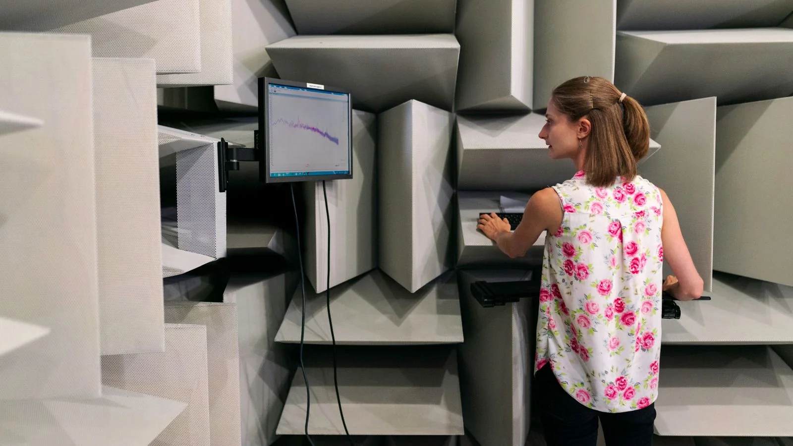 Reviewer testing headphones in a studio setting, the real-world conditions TechRadar prefers to lab benches