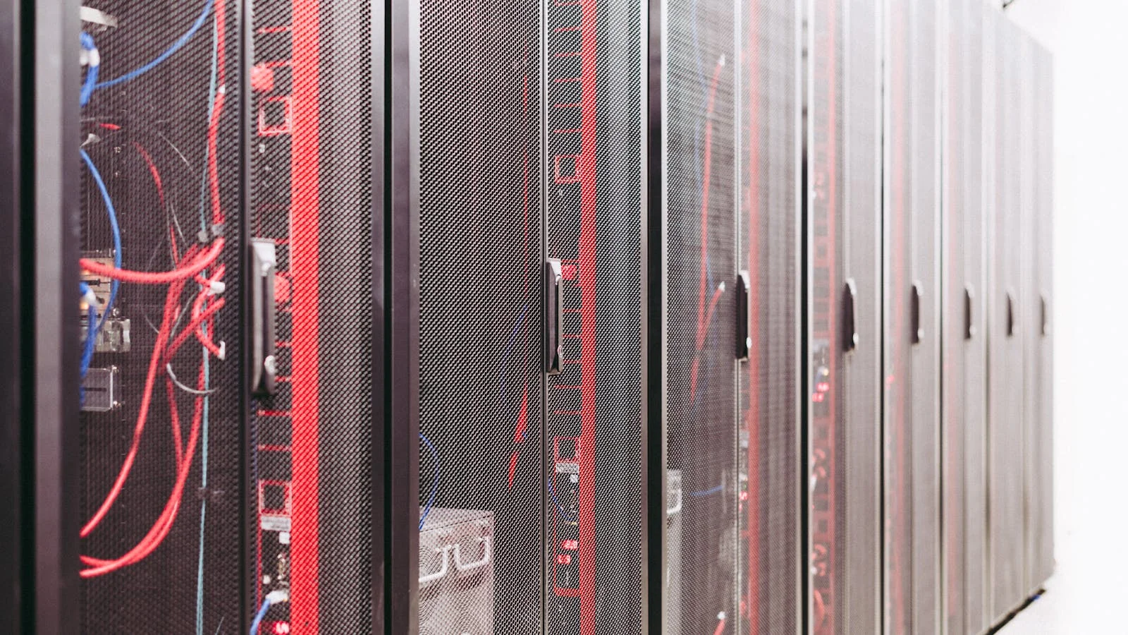 Server racks with managed cabling inside a data center, representing large-scale web crawling.
