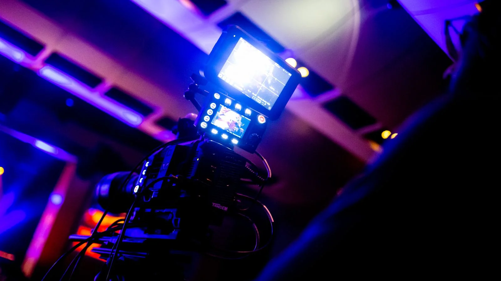 Broadcast camera under studio lights, the fixed production schedule a news pitch has to fit into