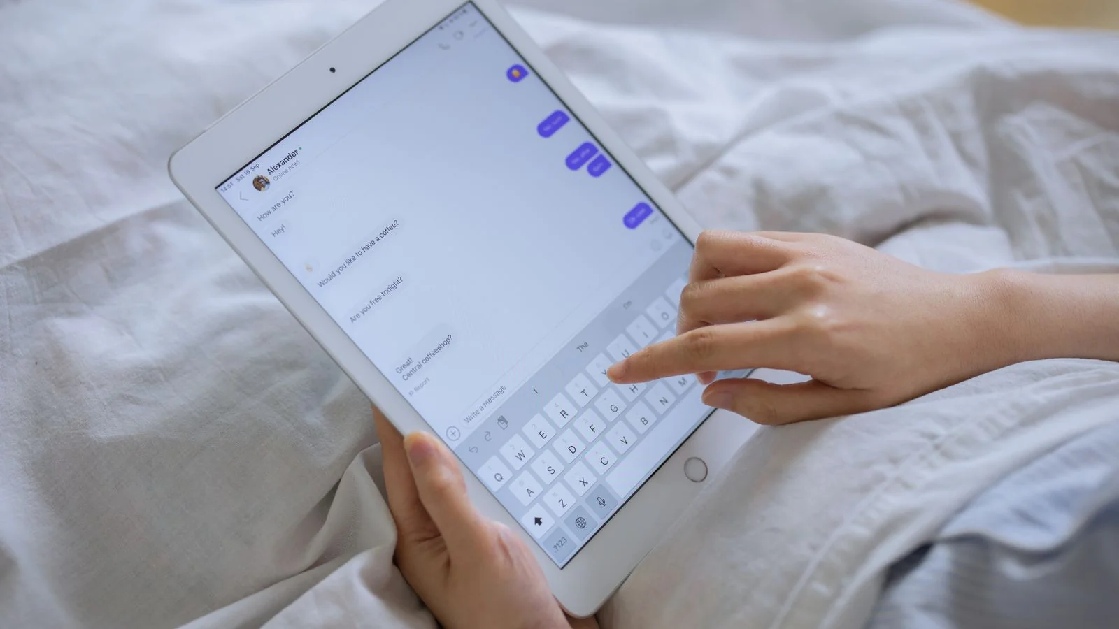 Hands typing a message on a tablet, where the pitch is won or lost in one line