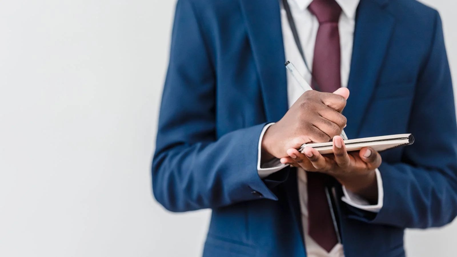 A reporter in a suit taking notes, the person you are pitching your install story to.