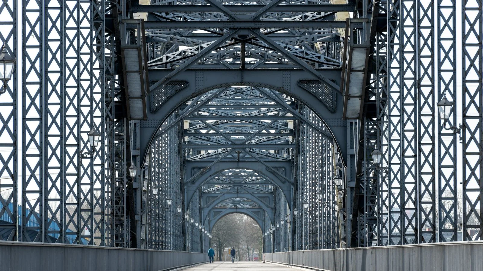 A steel bridge span, the infrastructure angle that makes a welding shop newsworthy to reporters.