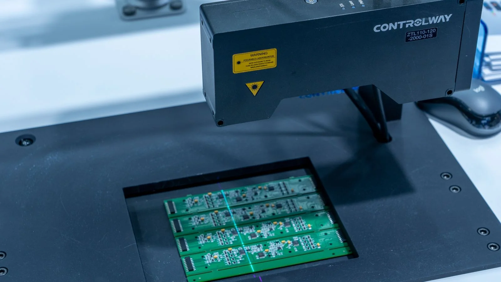 Automated circuit board inspection in progress, the kind of measured testing a lab review rests on