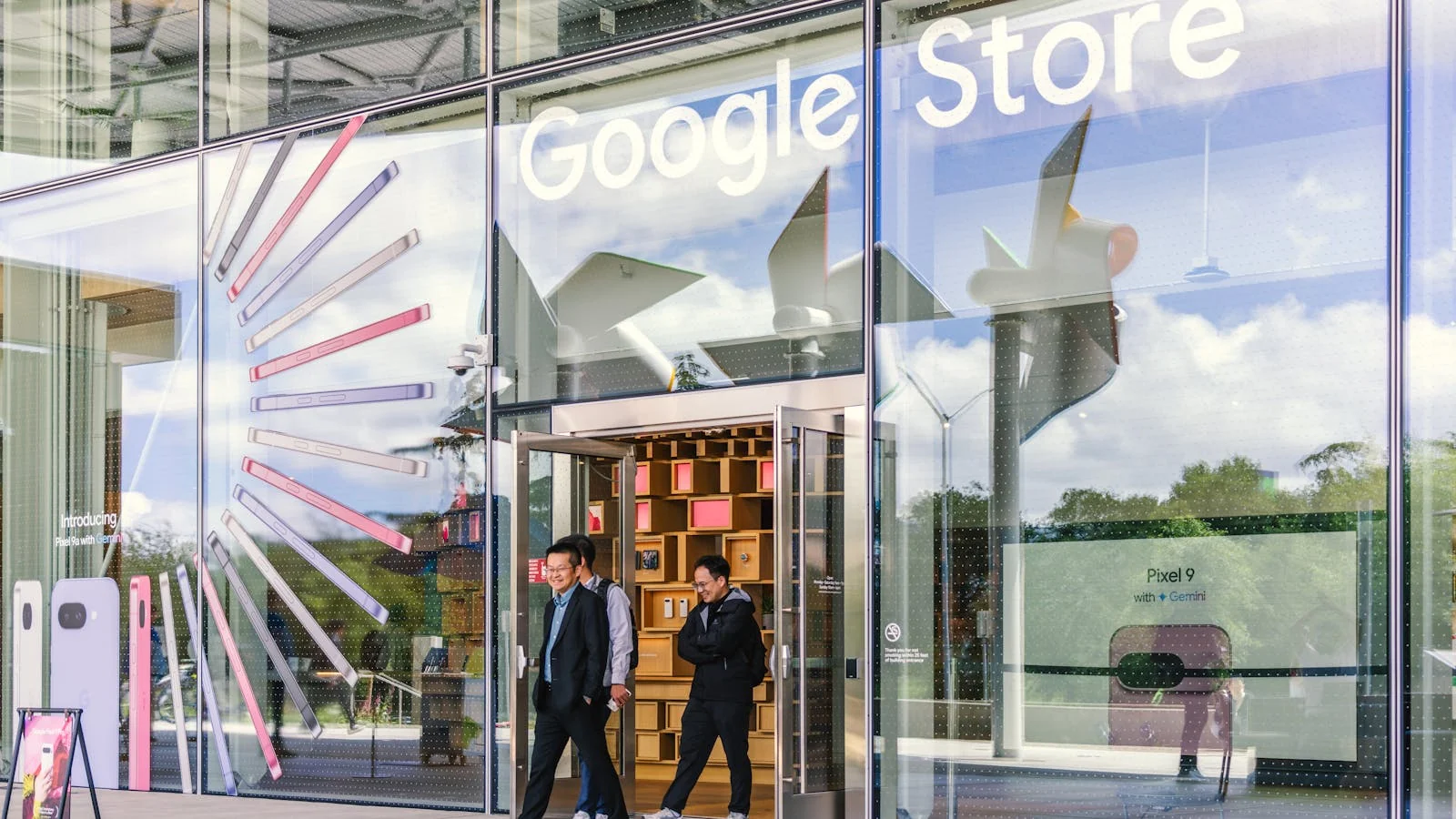 Glass facade of a Google Store entrance, the consumer face of an entity ecosystem where Knowledge Panel completeness becomes a brand-visibility lever.