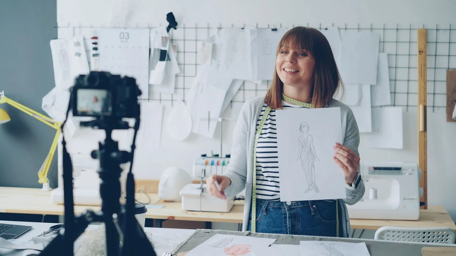 Creator filming a tutorial in a studio, turning a repeated service into a packaged product
