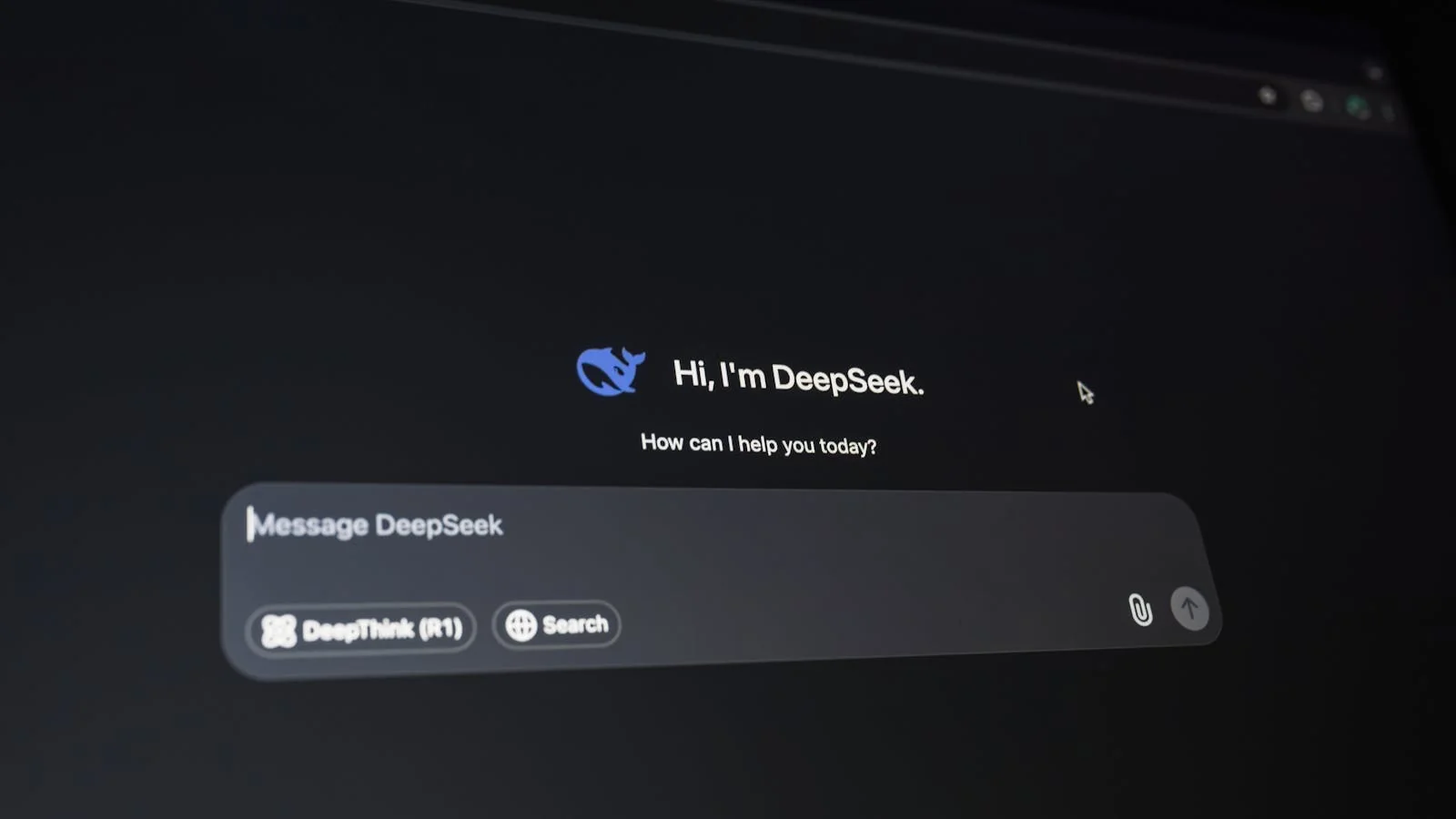 Conversational AI dark-mode interface on a screen showing a search query and answer in progress