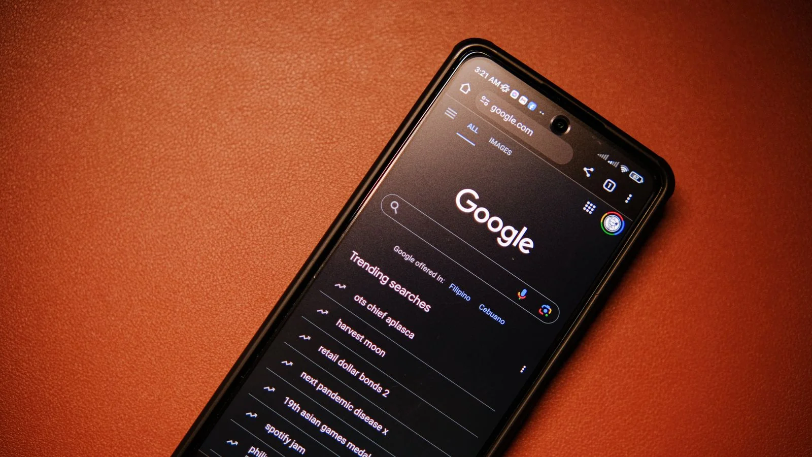 A smartphone showing Google search trends, where name searches happen on the move