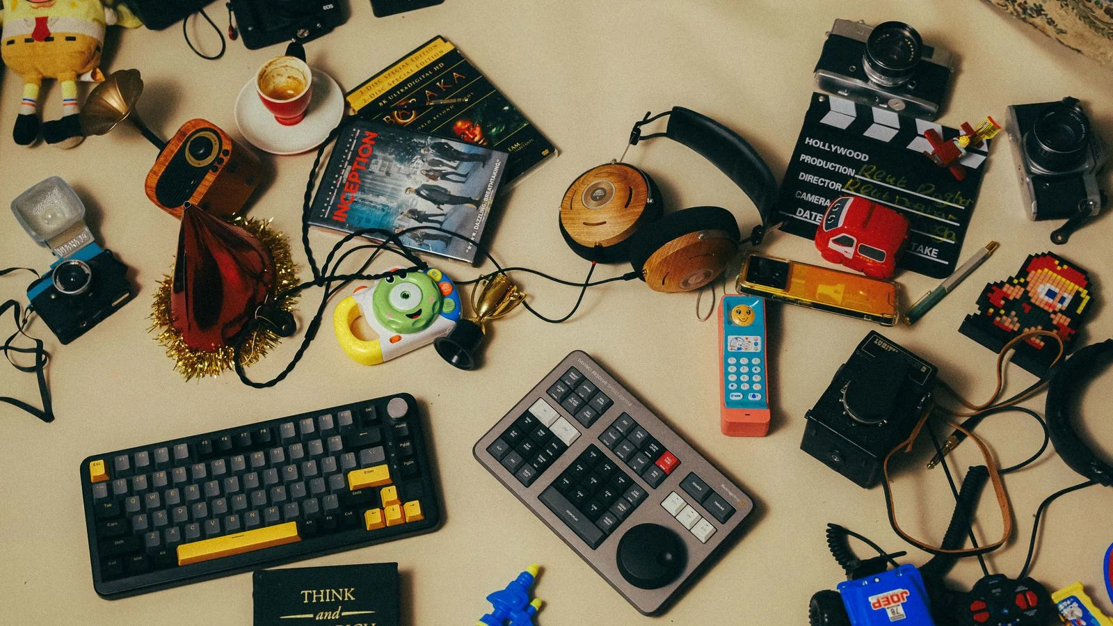 Cluttered desk covered in gadgets and tangled cables, the lived reality Gizmodo writes technology from