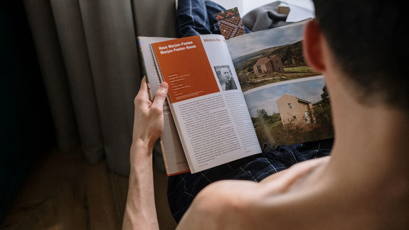 Reader absorbed in a book on a specific subject, the kind of expertise this desk buys