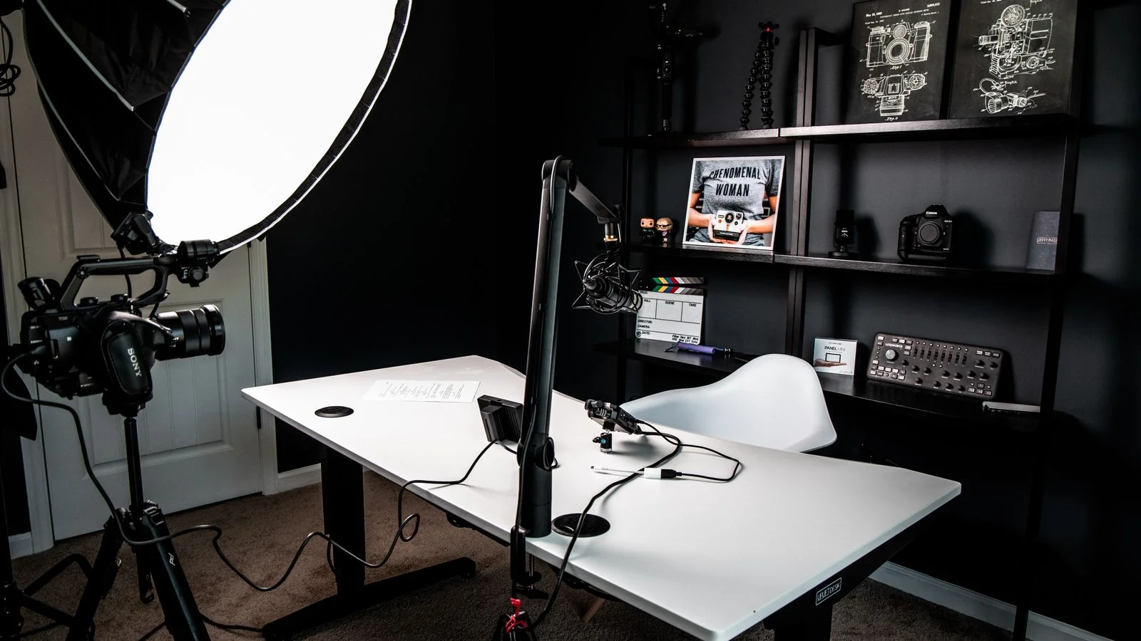 Home studio with ring light and camera set up for a live broadcast