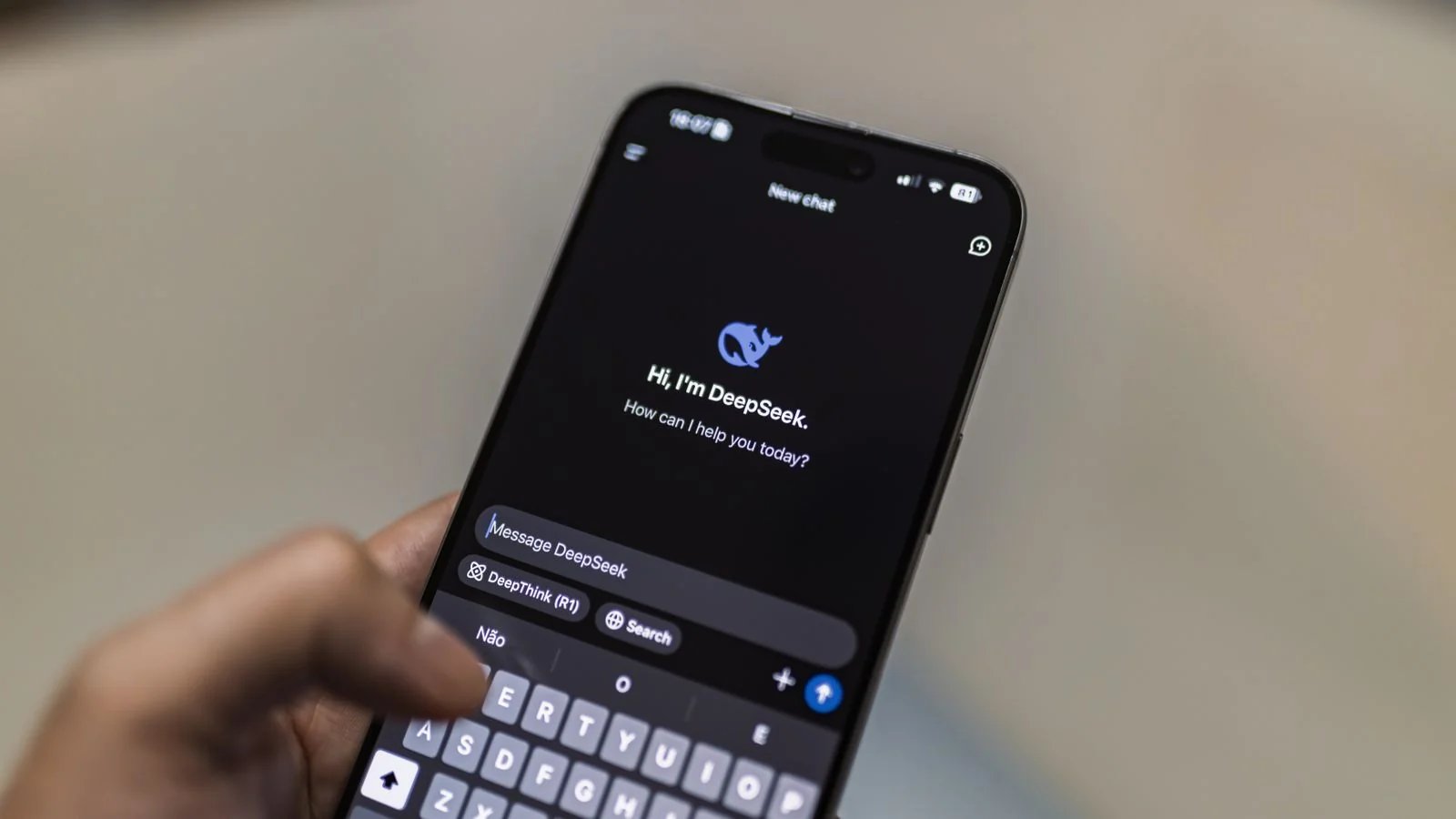 A smartphone screen showing an AI chatbot conversation, the drafting tool that sits inside the production chain