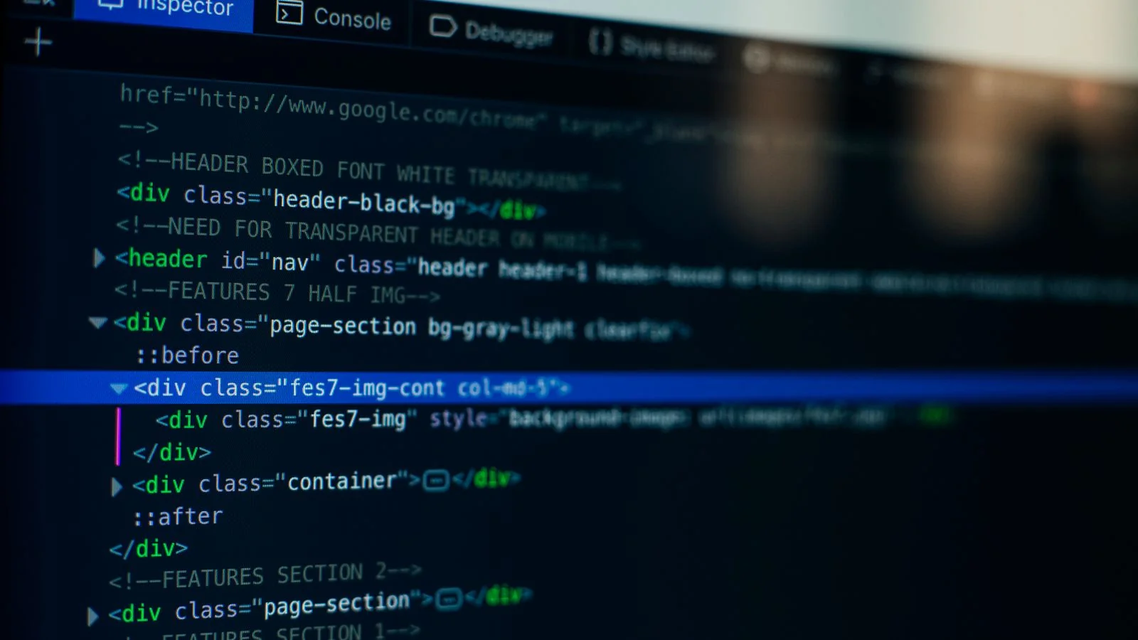 Close-up of HTML code on a computer screen with syntax highlighting, the kind of view a developer uses when validating schema before pushing to production