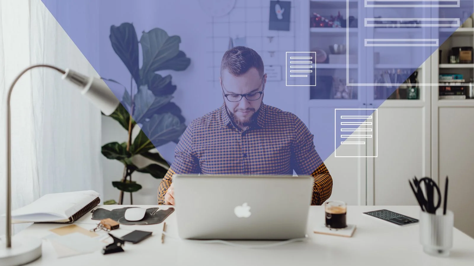 Man working on a laptop with digital overlays, the way a project editor scans an image set