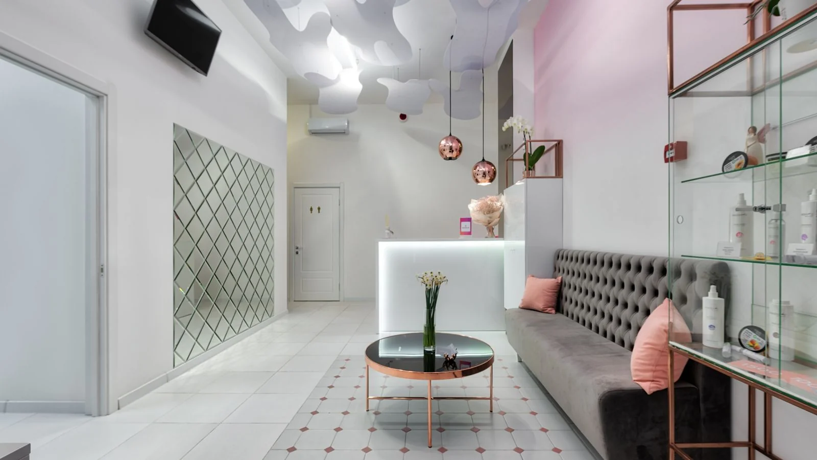 A calm clinic reception with seating and clean lines, the access story a health desk will actually cover