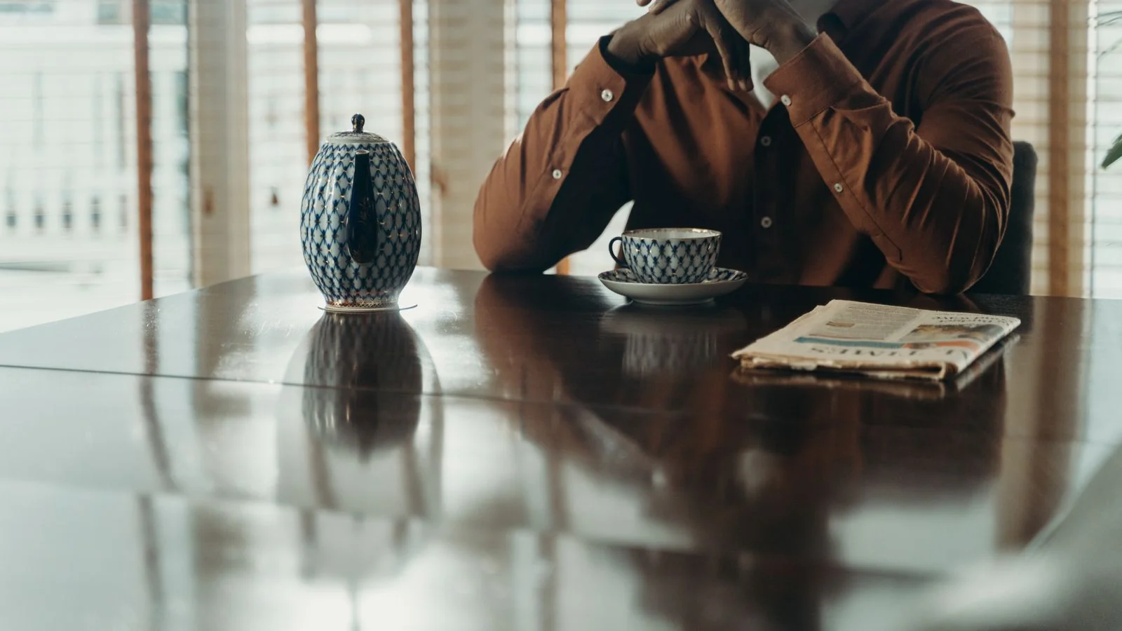 A quiet indoor moment with a hot drink, the twenty seconds an editor gives your release before deciding.