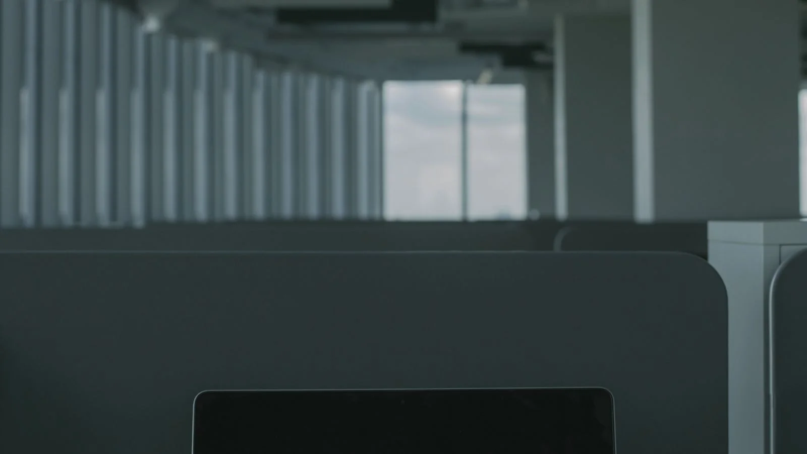 A laptop screen displaying cyber security text, a reminder that reputation is monitored across several surfaces at once