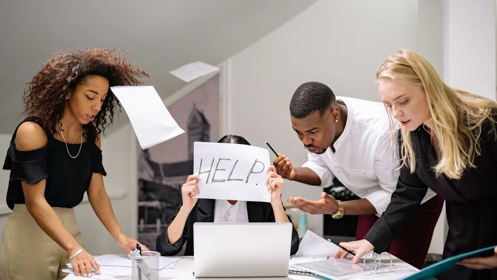 A team handling a stressful moment at the office, the kind of pressure pre-built reputation reserves relieve