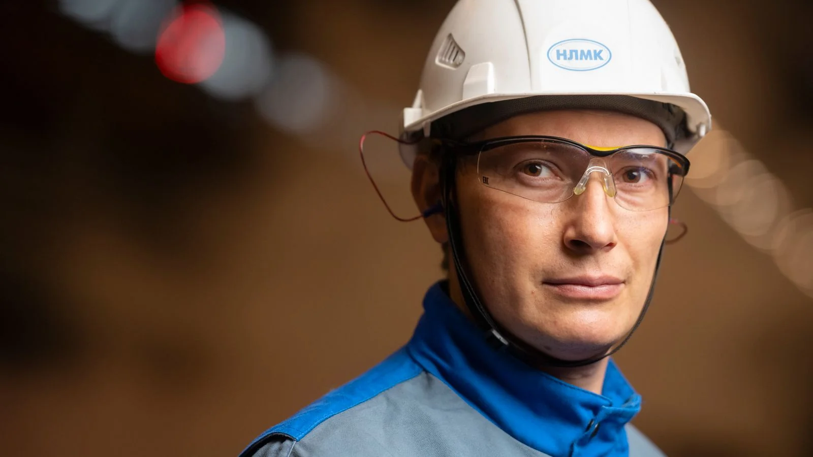 A confident technician in a safety helmet and goggles, the kind of pro customers remember.