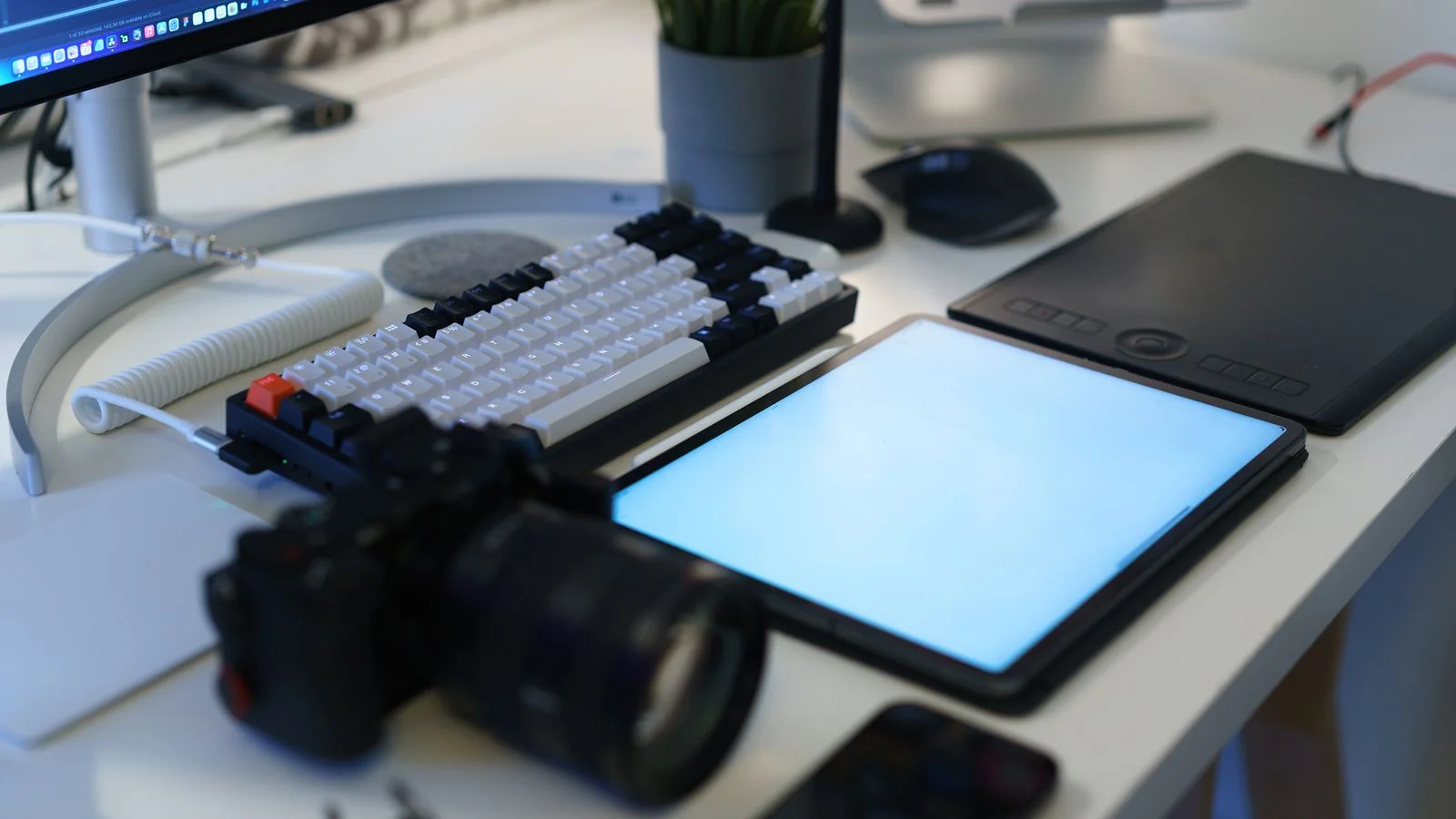 A modern home office with photography equipment and a tidy desk, the kind of intentional setting that adds credibility