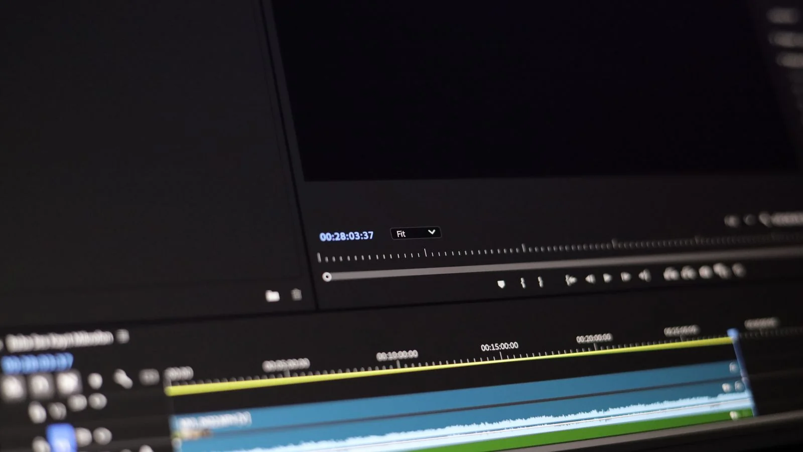 Close-up of video editing software showing a timeline and editing controls on screen