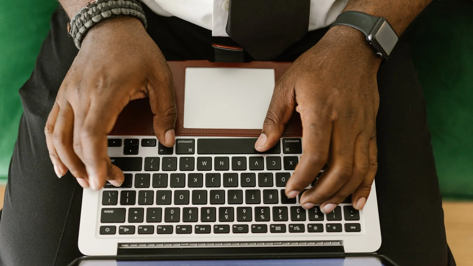 A founder reviewing pitch drafts on a laptop in a quiet morning workspace, the kind of writing pass that decides whether an AI company press release gets opened.