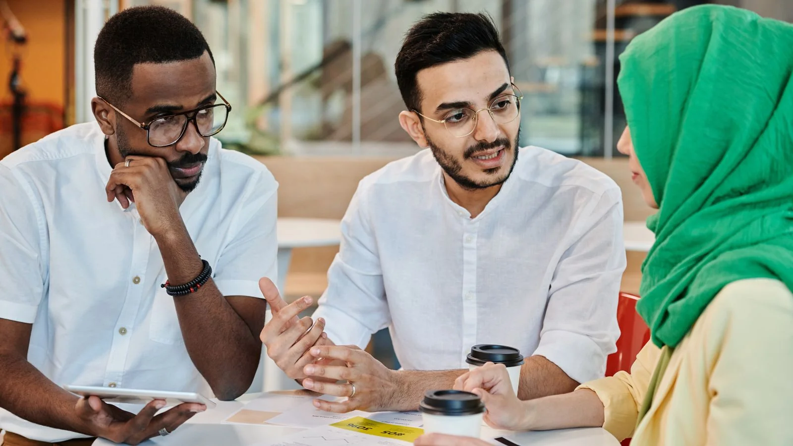 Diverse team collaborating in a bright office, the future hires a growth announcement is meant to attract