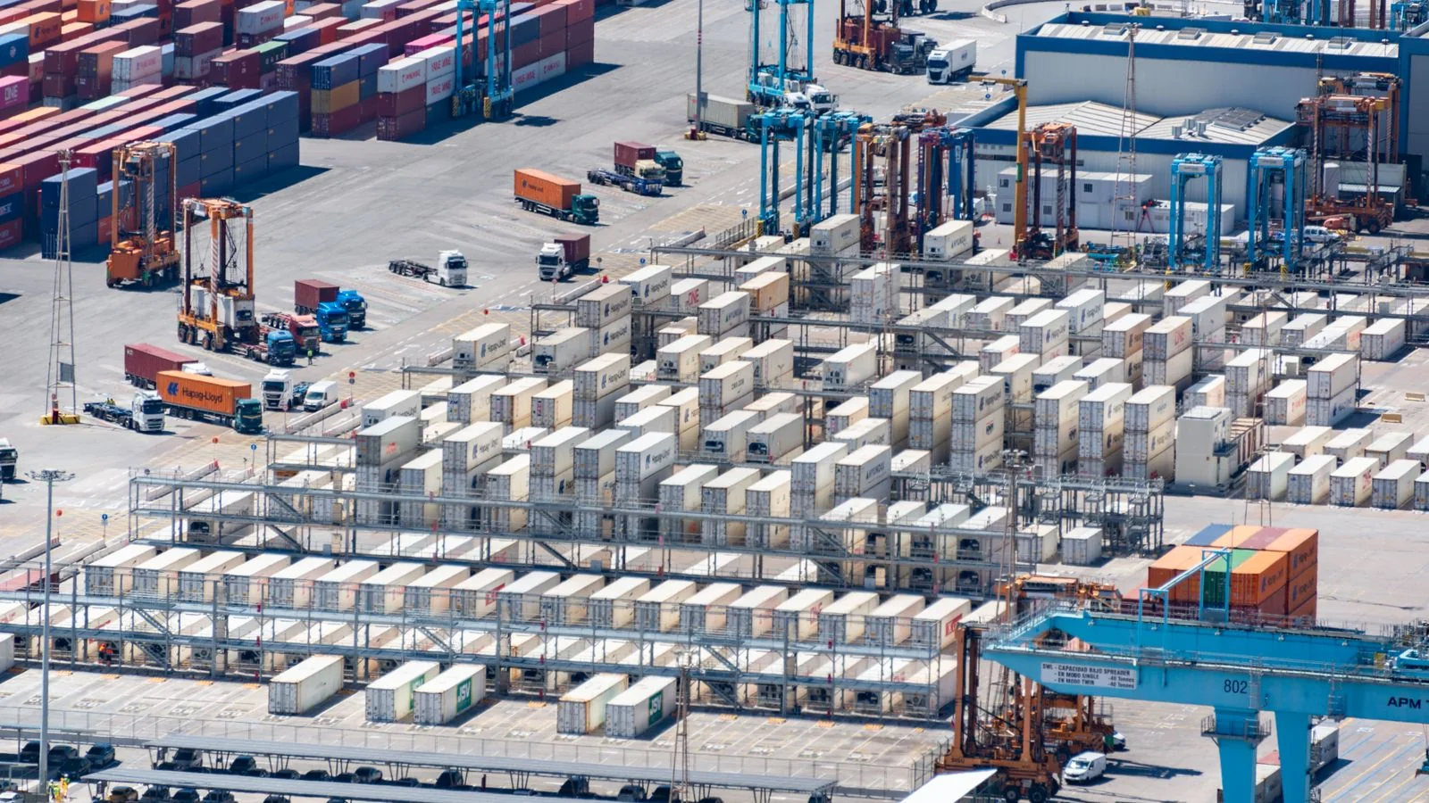 A vibrant display of stacked shipping containers highlighting industrial organization